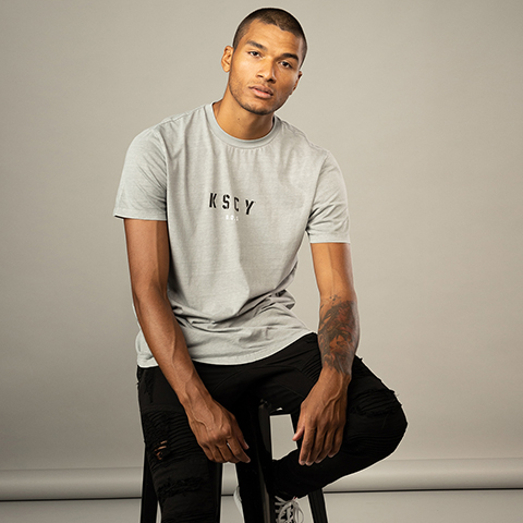 Man posing for the camera wearing City Beach New Arrivals